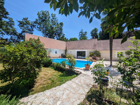 Maison 7 pièce(s) 210 m²